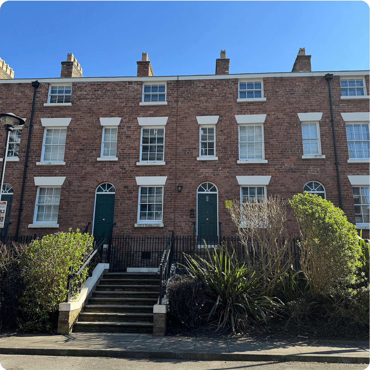 A Georgian building fitted with several bespoke timber Georgian sash windows which were made and fitted by Preferred Joinery.